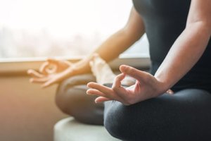 individual using yoga therapy during treatment